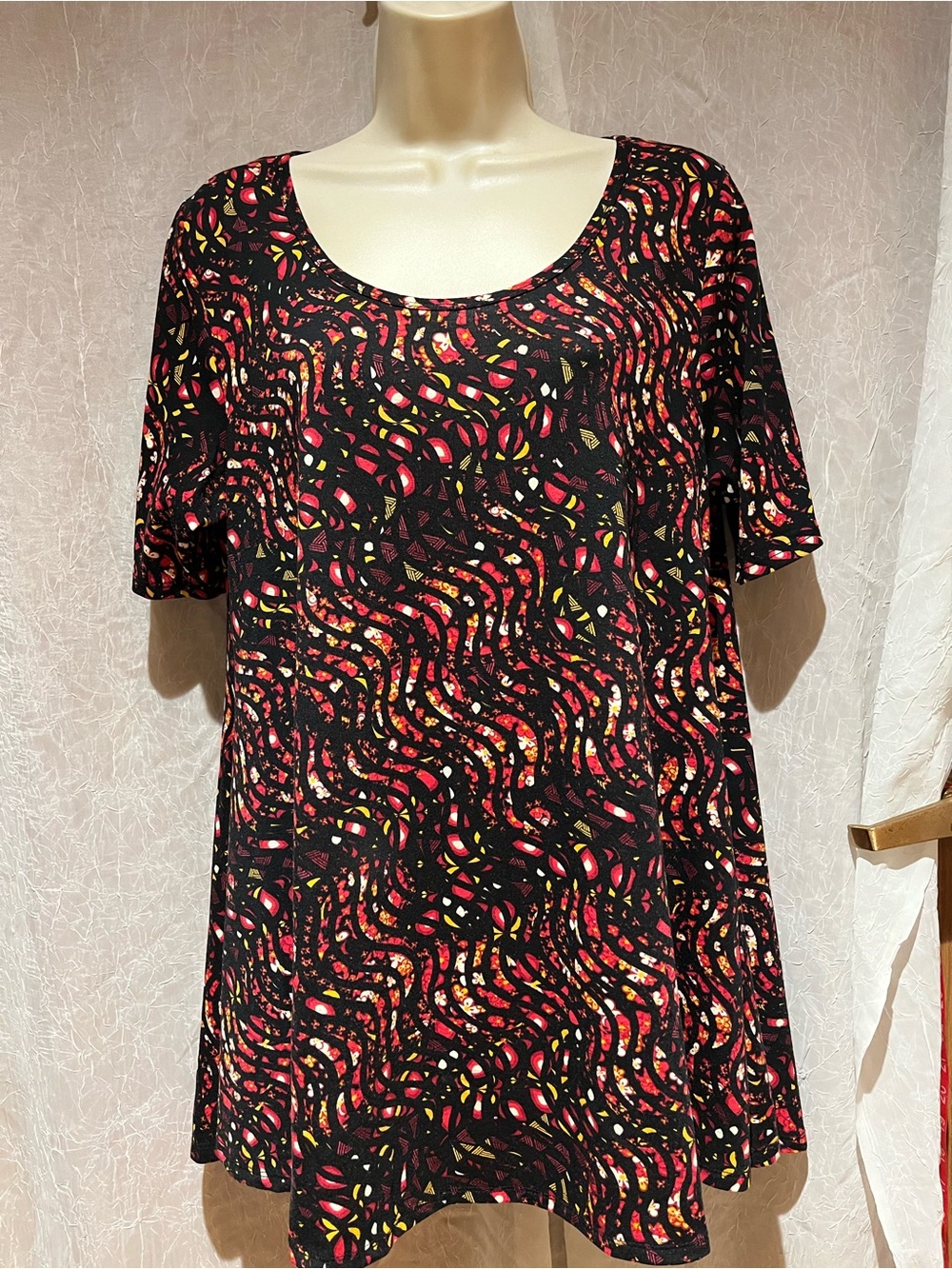 LuLaRoe Black Scoop Neck Tunic with Red and Yellow Abstract Print